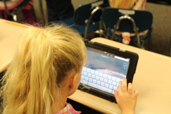 child using an ipad