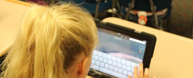 child using an ipad