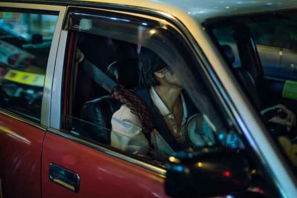 person in car