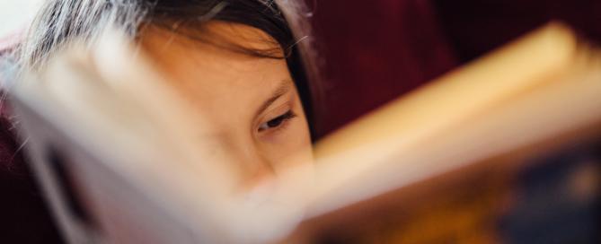 child reading book