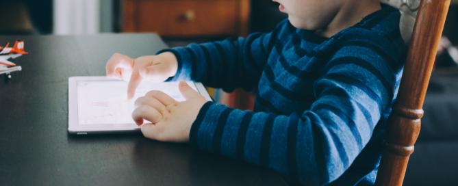 kid looking at screen