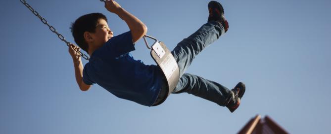child on swing