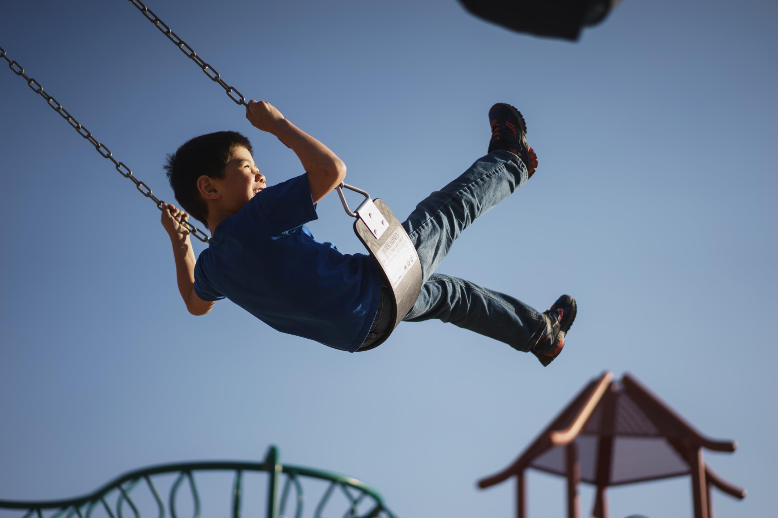 child on swing