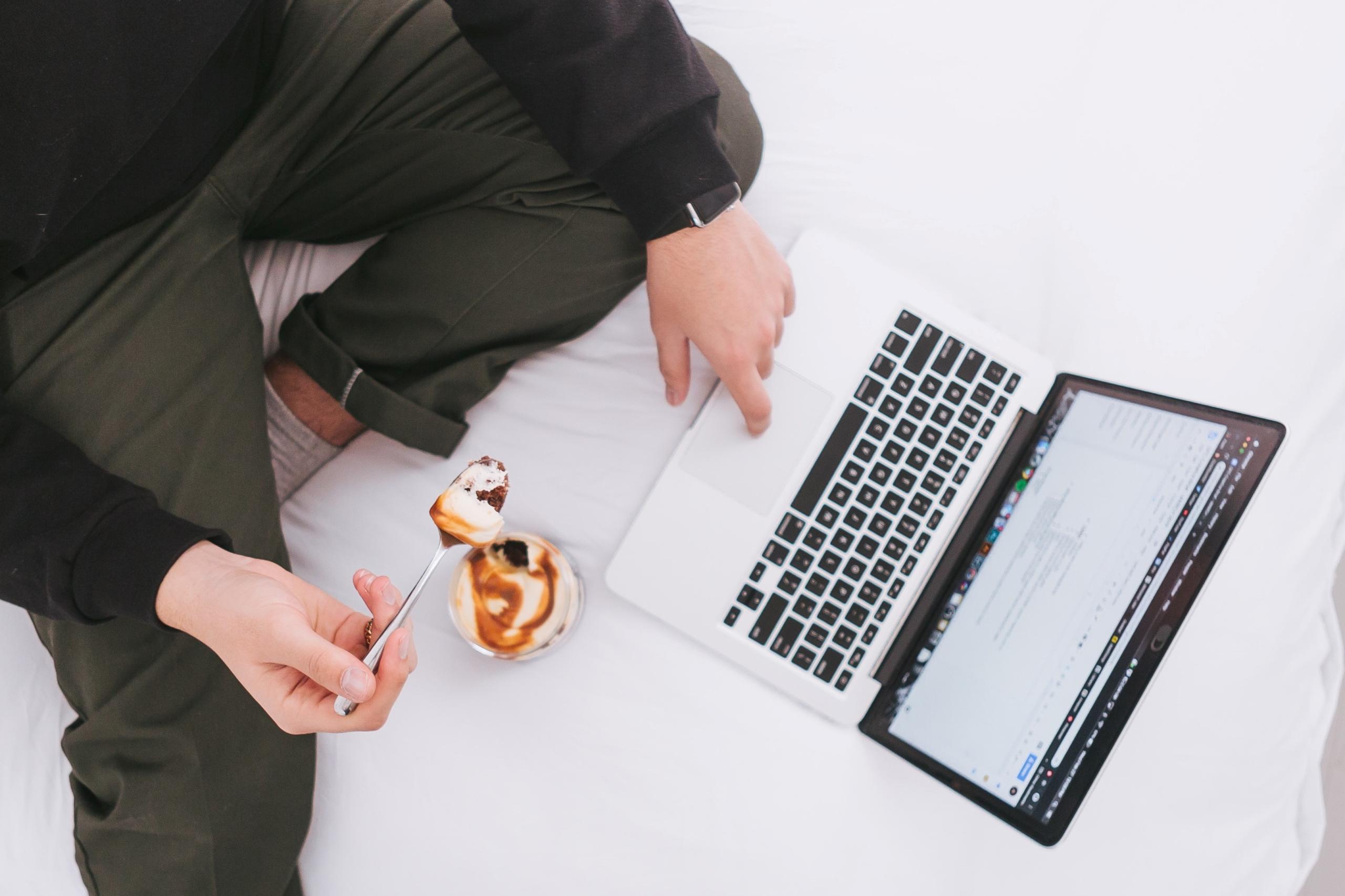 eating next to laptop