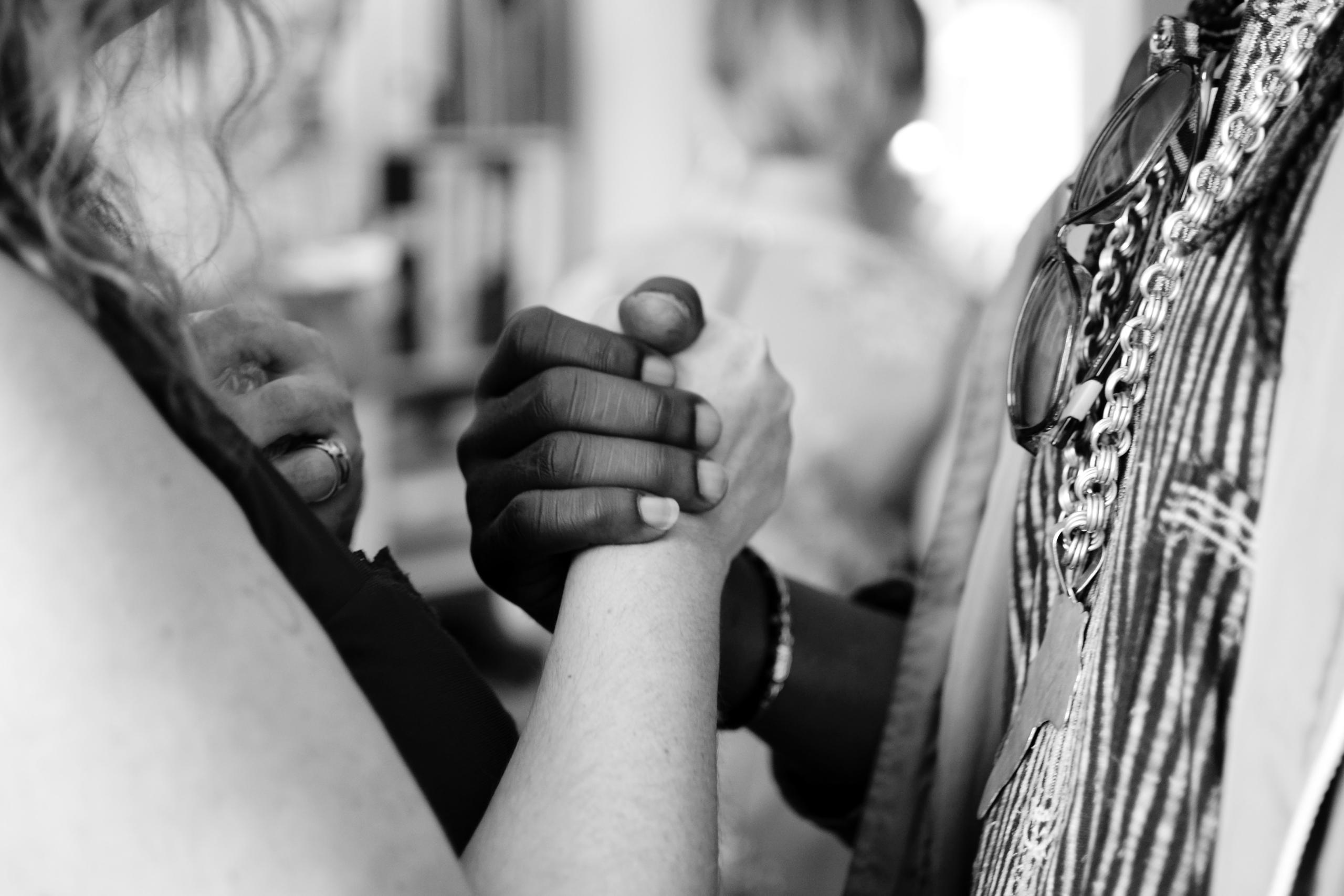 two people holding hands