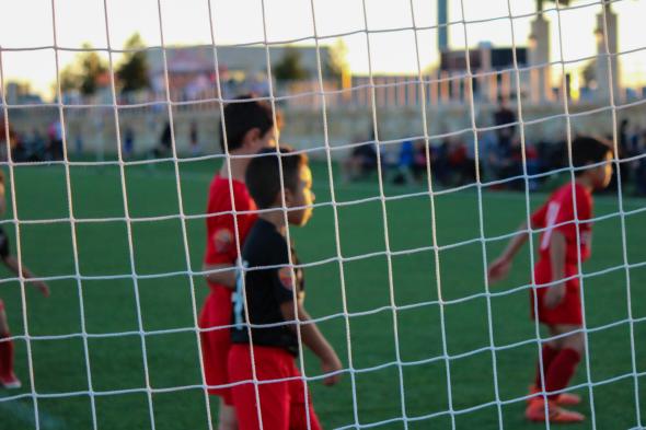 students playing soccer