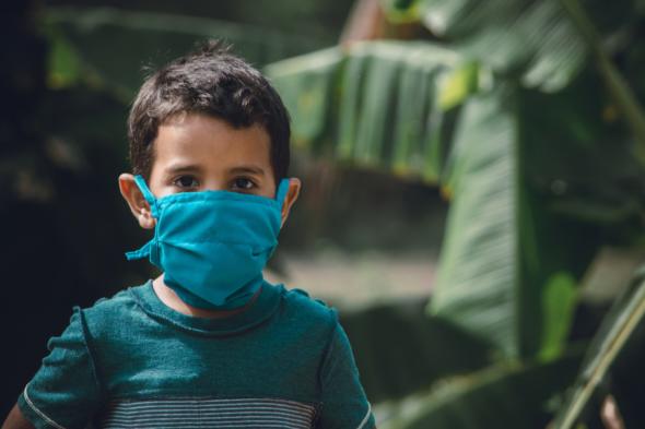 child wearing a mask