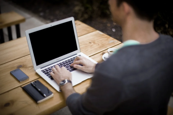 man on computer