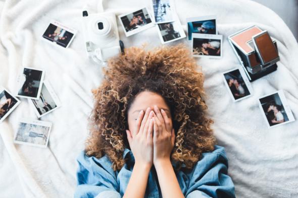 girl covering her face