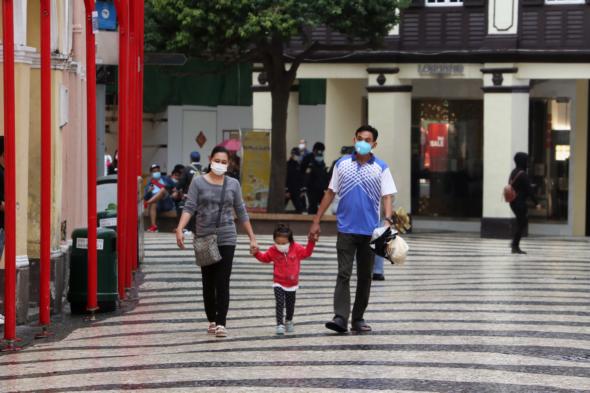 family in face masks