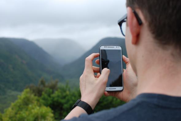 man looking at their phone