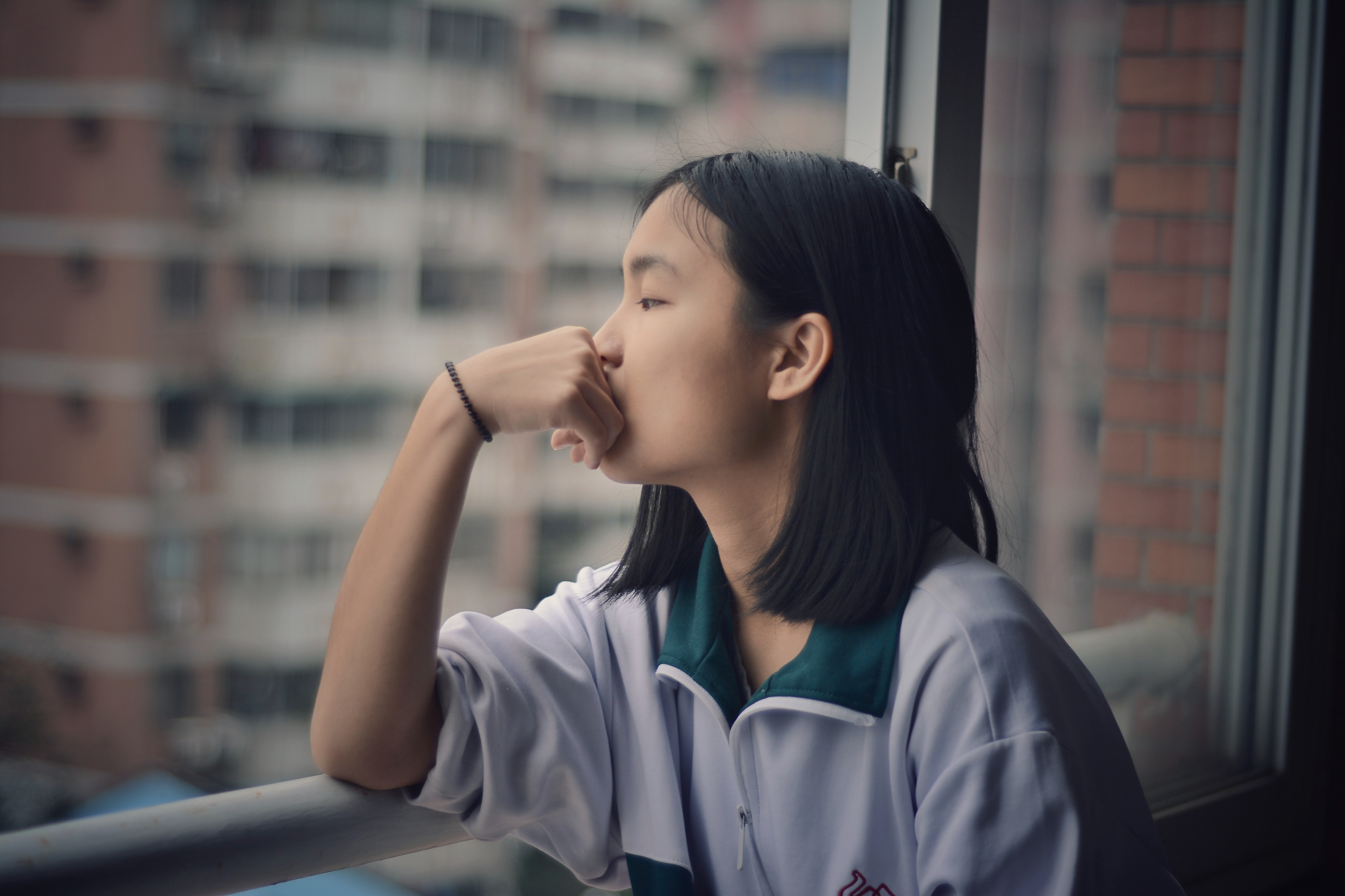 Pensive, pondering teen