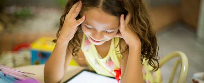 Young girl on tablet device