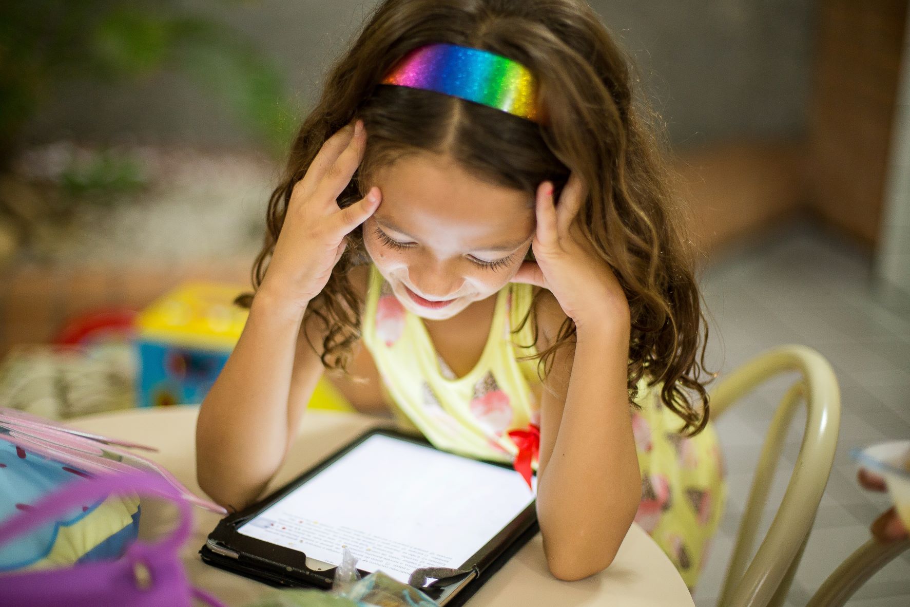 Young girl on tablet device