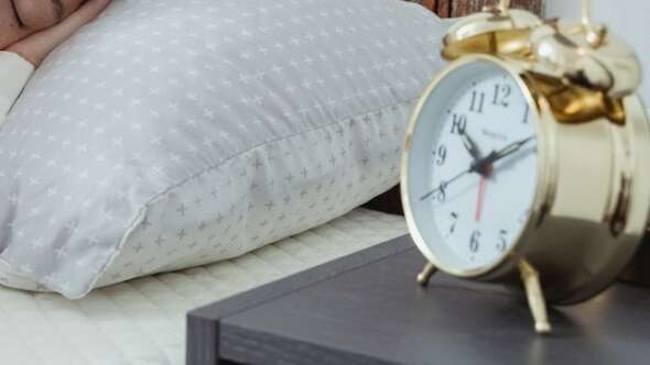 sleeping near alarm clock