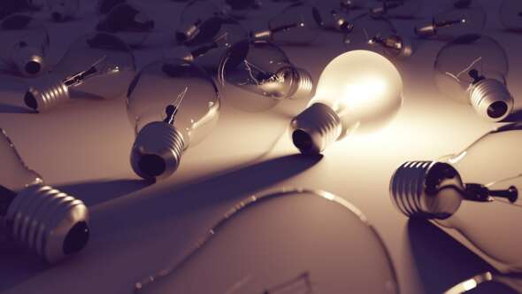 A group of light bulbs connected by wires, where only 1x is bright and shining