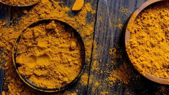 Swallow pot of tumeric powder